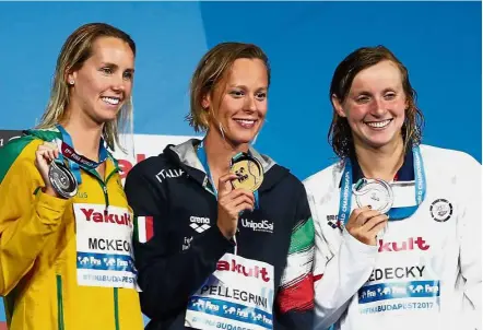  ??  ?? No easy feat: Winners of the women’s 200m freestyle (from left) Emma McKeon of Australia, Federica Pellegrini of Italy and Katie Ledecky of the United States posing with their medals. Below: Italy’s Gabriele Detti with his men’s 800m freestyle gold...