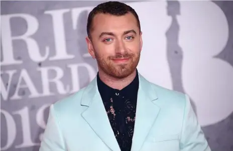  ?? Photo: Joel C Ryan/Invision/AP ?? CALL ME THEM: Oscar-winning pop star Sam Smith posing at the Brit Awards in London in February.