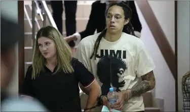  ?? AP ?? WNBA star and two-time Olympic gold medalist Brittney Griner is escorted to a courtroom for a hearing, in Khimki just outside Moscow, Russia, Friday. Griner is set to go on trial in a Moscow-area court on cannabis possession charges.