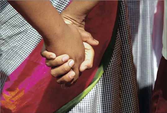  ??  ?? ON SAME WAVELENGTH: People with autism at the World Autism Awareness Day in Bangalore, India. The writer says her son’s rejection was heartbreak­ing.