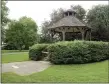  ?? H John Voorhees III / Hearst Connecticu­t Media ?? The bandstand in Ballard Park, which Darlene Flagg helped erect, includes a memorial stone in Flagg’s name in the walkway. Flagg was a passenger on Flight 77 on Sept. 11, 2001.