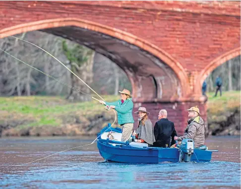  ??  ?? LICENCES WORRY: Meikleour Fishing on the opening day of the salmon season on the Tay under Kinclaven Bridge.