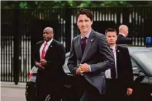  ?? AFP ?? Canadian Prime Minister Justin Trudeau will meet with Premier Li Keqiang, Alibaba Group Holding’s Jack Ma and Hong Kong billionair­e Li Ka-Shing during his China visit.