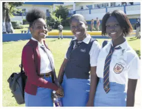  ?? (Photos: Garfield Robinson) ?? Grade 11 Iona High School students (from left), Kimberly Grandison; Jalissa Bygrave, wearing her prefect vest, and Dashanae Johnson