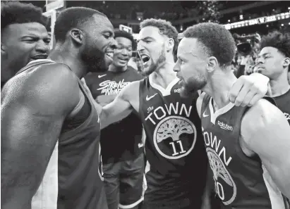  ?? EZRA SHAW/GETTY IMAGES ?? From left, Draymond Green, Klay Thompson and Steph Curry have reached the NBA Finals every year since 2014-15, winning the title three times.