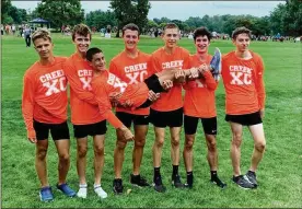  ?? CONTRIBUTE­D ?? The Beavercree­k boys cross country team is ranked No. 5 in the state. The team consists of (from left) Andrew Radford, Keegan Souhan, Tayton Hess, Connor Ewert, Andrew Woodard, Ryan Massie and (being held) Brenden Baker.