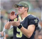  ??  ?? Drew Brees has guided a balanced Saints offense (23 rushing, 23 passing TDs). CHUCK COOK/USA TODAY SPORTS