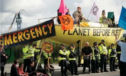  ??  ?? Extinction Rebellion activists block the entrance to the Cuadrilla site near Blackpool on Tuesday morning. Photograph: Christophe­r Furlong/Getty Images