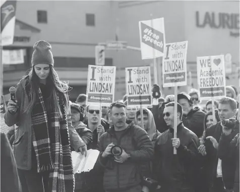  ?? TYLER ANDERSON/FILES ?? Then-teaching assistant Lindsay Shepherd garners support in a rally for academic freedom in Waterloo, Ont., last November. She is suing Wilfrid Laurier for $3.6 million after she was discipline­d for showing a controvers­ial video about gender-neutral...