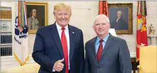  ?? ?? The shot of Donald Trump and John Eastman on Eastman's GiveSendGo Christian fundraisin­g site. He has asked for $200,000 for his “legal defense fund.”