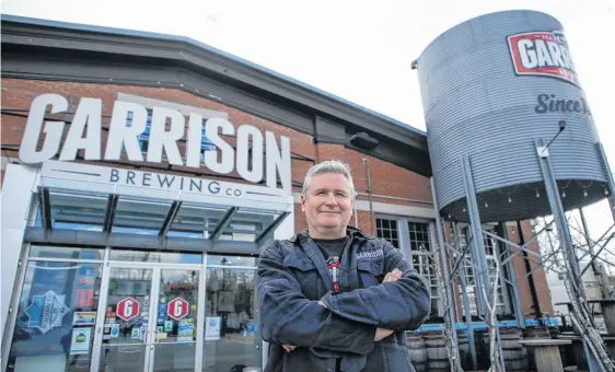 ?? TIM KROCHAK ■ THE CHRONICLE HERALD ?? Brian Titus, president of Garrison Brewery and past-president of the Craft Brewers Associatio­n of Nova Scotia, stands in front of his brewery at Halifax Seaport earlier this week.