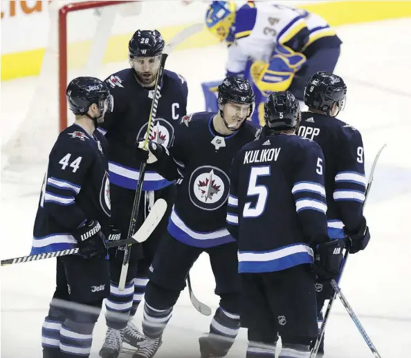  ?? TREVOR HAGAN/THE CANADIAN PRESS ?? The Winnipeg Jets have been good, but not so much when away from home lately — they are 0-4-2 over their last six road games with visits looming this week to Nashville, Boston and New York before the Christmas break.