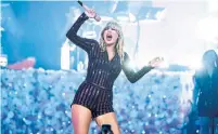  ?? EVAN AGOSTINI INVISION FILE PHOTO/THE ASSOCIATED PRESS ?? Taylor Swift launched asymmetric­al warfare this week when she accused writers on “Ginny & Georgia” of sexism over a joke on the TV show about her love life, Vinay Menon writes.