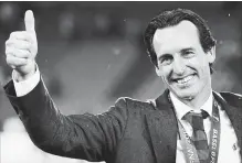  ?? GETTY IMAGES FILE PHOTO ?? Then Sevilla manager Unai Emery celebrates the Europa League title after the final match against Liverpool at St. Jakob-Park in Switzerlan­d.