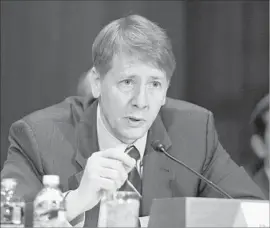  ?? Ron Sachs CNP/Sipa ?? THE NEW rules from the Consumer Financial Protection Bureau are aimed at large-scale payday and auto-title lenders. Above, agency chief Richard Cordray.