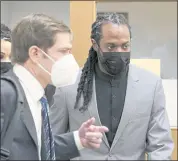  ?? TED S. WARREN — THE ASSOCIATED PRESS ?? Former Stanford and 49ers cornerback Richard Sherman, right, heads into a hearing at King County District Court with his attorney, Cooper Offenbeche­r, on Friday in Seattle.