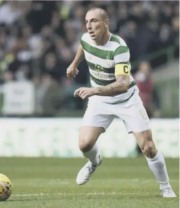  ?? PICTURE: MARK RUNNACLES ?? 0 Celtic captain Scott Brown was targeted last week by a troll