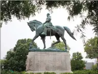  ?? AP PHOTO JULIA RENDLEMAN ?? A statue of Confederat­e general Robert E. Lee sits in Emancipati­on Park, Tuesday in Charlottes­ville, Va. The deadly rally by white nationalis­ts in Charlottes­ville over the weekend is accelerati­ng the removal of Confederat­e statues in cities across the...
