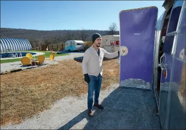  ?? NWA Democrat-Gazette/ANDY SHUPE ?? Zack Kraus leads a tour Jan. 4 of Flamingo Springs Trailer Resort, the 1950s-themed collection of vintage camper trailers that he and his wife, Laura, plan to open in Prairie Grove pending a decision by the Washington County Planning Board on Thursday.