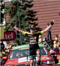  ?? AFP ?? Slovenia’s Primoz Roglic celebrates as he crosses the finish line during the 183km seventeent­h stage of the Tour de France. —