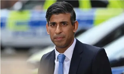  ?? Photograph: WPA/Getty Images ?? Rishi Sunak at Kilburn police station in London on Wednesday. His home secretary hopes officers there will soon be busy thoroughly investigat­ing every crime.