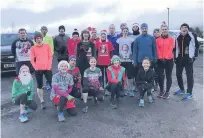  ??  ?? Festive cheer Club members at a previous Christmas run