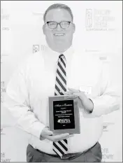  ?? LOANED PHOTO/DAVID COLLIE ?? YUMA UNION HIGH SCHOOL Communicat­ions Director Matthew Buckley displays an Award of Excellence from the Arizona School Public Relations Associatio­n (ASPRA) in recognitio­n of the strategy and creative execution of the “Ready Now Yuma” campaign. Each...