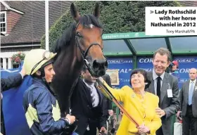  ?? Tony Marshall/PA ?? Lady Rothschild­with her horse Nathaniel in 2012