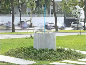  ?? HENG CIVOAN ?? The barren pedestal where a piece of public art commemorat­ing the victims of the Khmer Rouge was briefly installed in Phnom Penh.