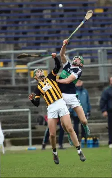  ??  ?? Cian Lohan of Bray Emmets and Adrian Hynes of Seir Kieran battle for possession.