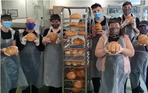  ?? ?? ●●Bakers rising to the challenge during the pandemic at Pure’s ‘The Kitchen’ bakery, on Chestergat­e, in Stockport.