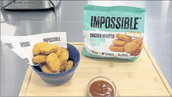  ?? PHOTOS BY TERRY CHEA — ASSOCIATED PRESS ?? Impossible Foods’ new meatless nuggets in Redwood City. The nuggets are now available at some restaurant­s and will be sold in grocery stores nationwide later this year.