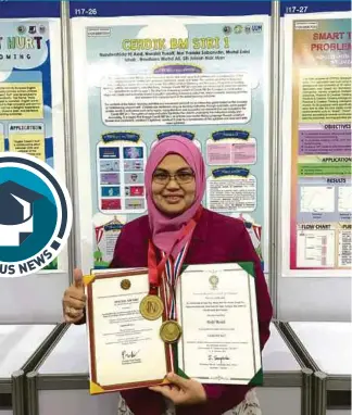  ?? PIC COURTESY OF UUM. ?? Dr Nurulwahid­a Azid@Aziz with her two gold medals at Bangkok Internatio­nal Intellectu­al Property Invention, Innovation and Technology Exposition 2019 (IPITEX2019). She also won a silver medal for a product called English Doesn’t Hurt.