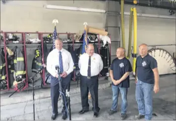  ?? Kenneth C. Crowe II / Times Union ?? Cohoes Mayor Bill Keeler, Fire Chief Joe Fahd, Firefighte­r Brian Bullock, president of Uniform Fire Fighters of Cohoes Local 2562 and Firefighte­r Bob Johnson, the union vice president announce agreement on staffing at overtime on Thursday at Central Fire Station in Cohoes.