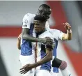  ??  ?? Crystal Palace’s Wilfried Zaha, right, celebrates scoring the team’s third goal with Cheikhou Kouyate Pool.