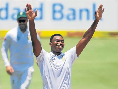  ?? /Reuters ?? Rise to the challenge: Lungi Ngidi celebrates taking the wicket of India’s Mohammed Shami on Wednesday. His six second-innings wickets were the seventh best by a South African on debut. The Proteas have won the India Test series with a match to spare....