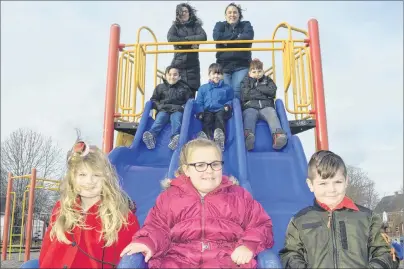  ?? JEREMY FRASER/CAPE BRETON POST ?? The Miners Memorial Playground has officially been moved from the former St. Joseph’s elementary school to Jubilee Elementary School in Sydney Mines. The playground equipment was installed at its new location at the end of November. Having a look at...