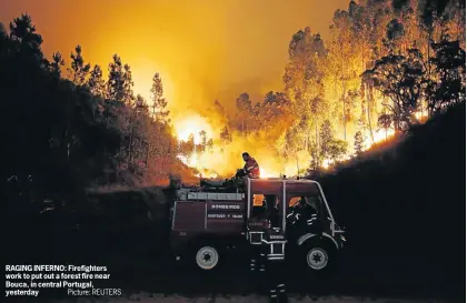  ?? Picture: REUTERS ?? RAGING INFERNO: Firefighte­rs work to put out a forest fire near Bouca, in central Portugal, yesterday