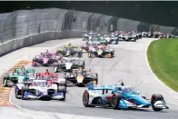  ?? AP Photo/Morry Gash ?? Josef Newgarden makes his way around Road America June 12 during the Sonsio Grand Prix auto race in Elkhart Lake, Wis.