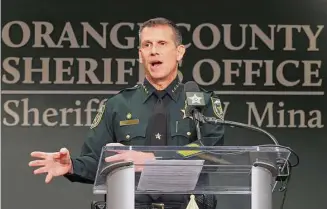  ?? Ricardo Ramirez Buxeda/Associated Press ?? Orange County Sheriff John Mina addresses the media during a news conference about multiple shootings on Wednesday in Orlando, Fla.