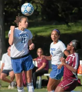  ?? Montgomery Media / BOB RAINES ?? Phil-Mont Christian’s Katharine Olinger heads the ball past Chichester’s Khadijah Ricks during Tuesday’s non-lleague action.