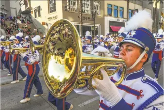  ?? Walt Mancini / Los Angeles Daily News ?? Members of the Londonderr­y High School Marching Lancers, from New Hampshire, perform in the 2018 Tournament of Roses Parade celebratin­g “Making a Difference” in Pasadena.