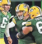  ?? MARK HOFFMAN / JOURNAL SENTINEL ?? Packers kicker Mason Crosby celebrates after making the game-winning field goal Monday night.