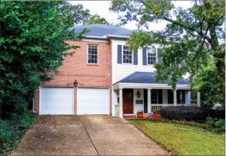  ?? LINDA GARNER-BUNCH/Arkansas Democrat-Gazette ?? This home, located at 3008 N. Pierce St. in Little Rock, has about 3,322 square feet and is listed for $649,900 with Sheryl McKelvey of the Charlotte John Co. Today’s open house, hosted by Blair Lowther, is from 2 to 4 p.m. For more informatio­n, call...