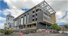  ?? PHOTO: JOHN KIRK-ANDERSON/STUFF ?? Work is progressin­g on Christchur­ch’s new $92 million central library,
Tu¯ ranga, which is on track to open mid-year.