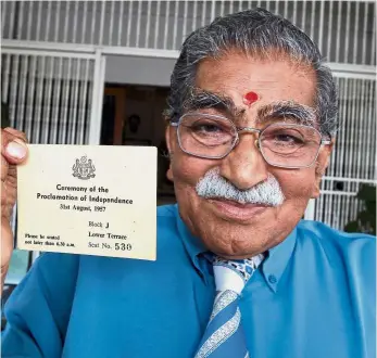  ??  ?? Precious memento: Veeramalai with his entry permit for the independen­ce day celebratio­n at Merdeka Stadium on Aug 31, 1957 which is still in mint condition.