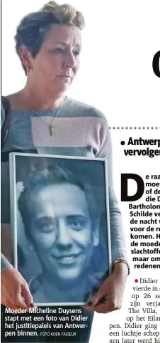  ?? FOTO KOEN FASSEUR ?? Moeder Micheline Duysens stapt met een foto van Didier het justitiepa­leis van Antwerpen binnen.