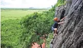  ??  ?? A member of Climb Yangon working a route on top-rope during rock climbing training at Bayin Nyi cave at Hpa-an, Karen state.