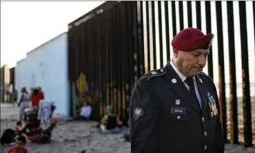  ?? JUSTIN SULLIVAN / GETTY IMAGES ?? Deported U.S. Army veteran Hector Barajas (foreground) founded the Deported Veterans Support House, also known as “The Bunker,” to support deported veterans by offering food, shelter, clothing as well as advocating for political legislatio­n that would...