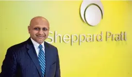  ?? KEVIN RICHARDSON/BALTIMORE SUN ?? Harsh K. Trivedi, president and CEO of Sheppard Pratt Health System, stands in the lobby of its new psychiatri­c care facility in Elkridge.